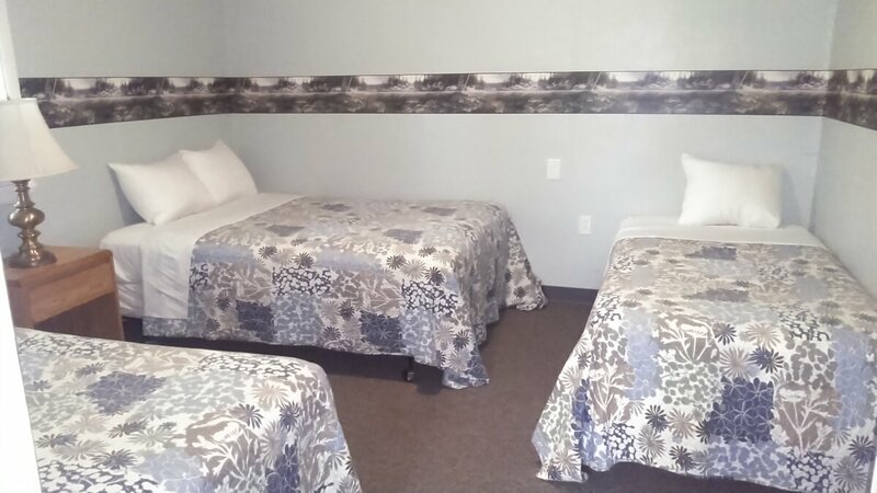 Bedroom #3 with 1 Full and 2 Twins