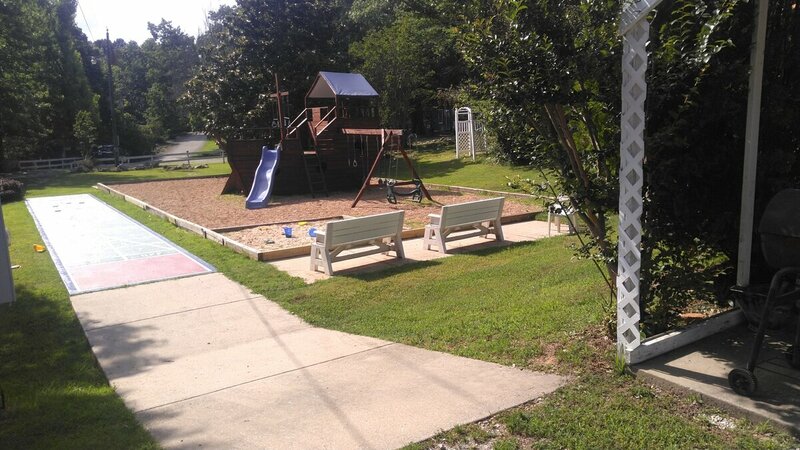 View of shuffle board court and kids area from 6 Patio